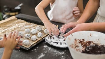 Hands kneading dough